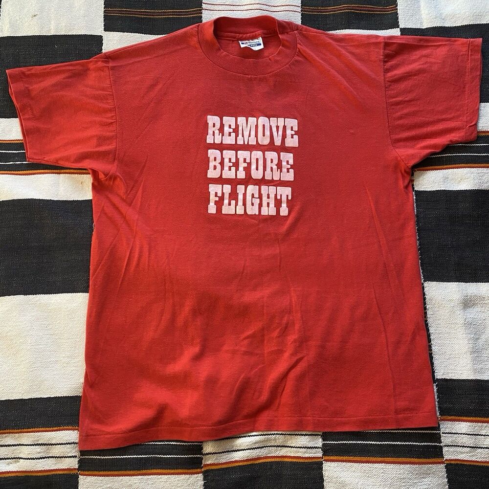Vintage Single Stitch Hanes Red Graphic Tee Shirt. “Remove Before Flight”. Large